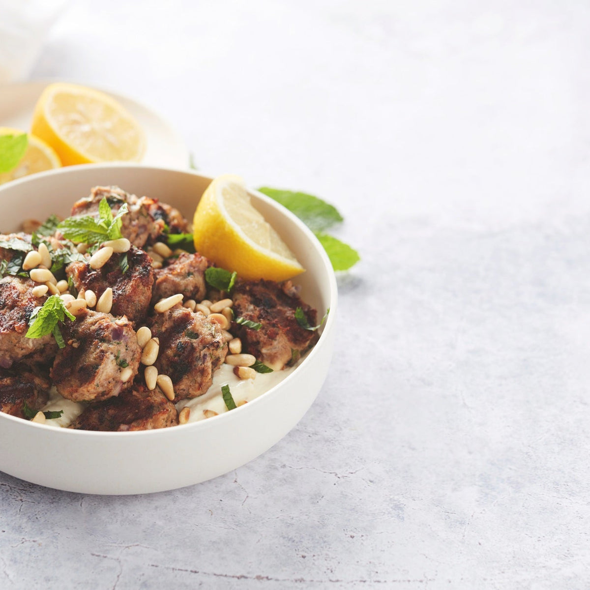 Grilled lamb meatballs with a delicious feta dip – Barbecook