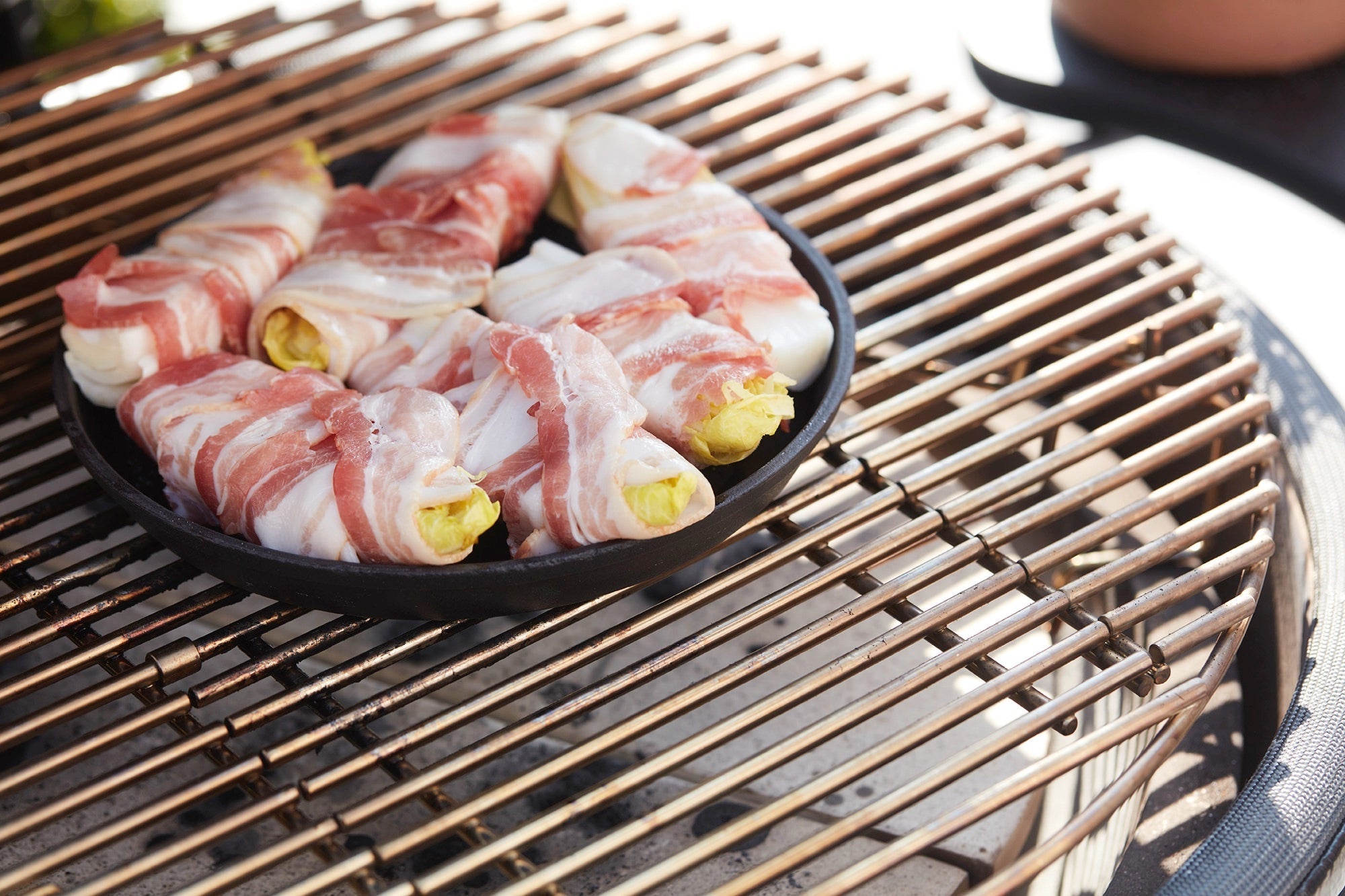 Chicory rolls with bacon on the BBQ