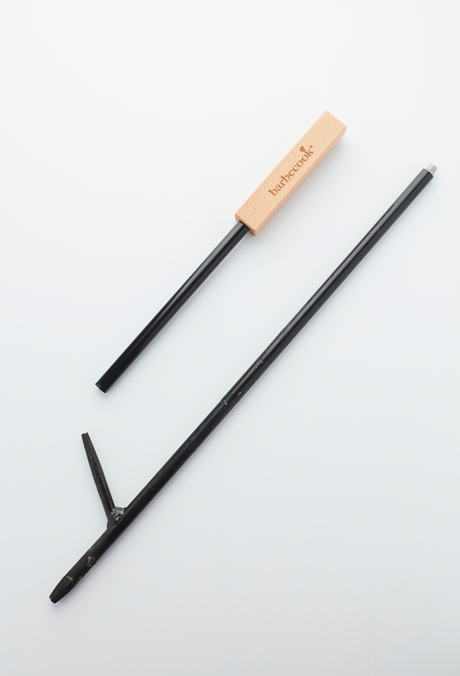 Tisonnier avec trou de soufflage